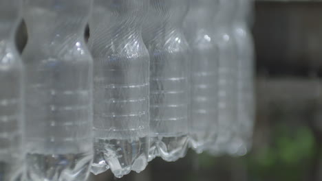 Plastic-bottles-are-filled-with-sparkling-mineral-water-in-the-bottling-plant