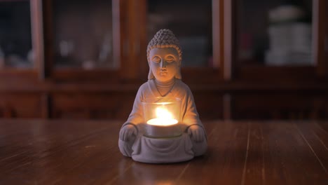 Candle-holder,-buddha-statue-in-meditation