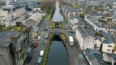 Aerial-footage-flying-over-a-river-key-gate-in-the-Irish-town-of-Athy