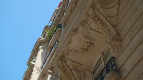 Balcony-Architecture-Structure-detail-captured-in-low-angle-on-old-Building-in-Paris,-France