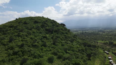 Forested-hill-near-African-farm,-in-Southern-Kenya,-village-of-Loitokitok