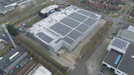 Aerial-of-solar-panels-on-rooftop-of-building-on-large-industrial-building