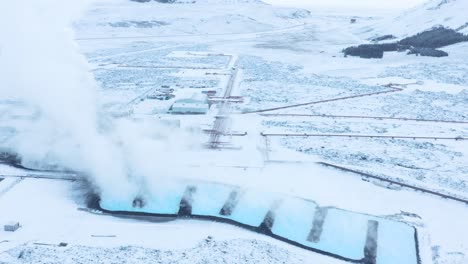 Steam-rises-from-spin-off-blue-water-of-Svartsengi-Geothermal-Power-Plant