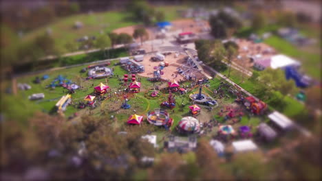 Tilt-shift-effect-makes-the-nostalgic-county-fair-carnival-event-look-like-miniature-toy-setup---creative-time-lapse