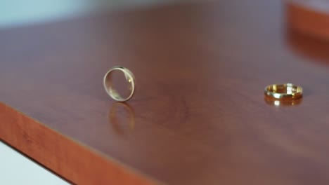 Wedding-ring-spinning-in-slow-motion,-close-up-shot