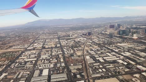 Southwest-Plane-Flying-Over-Las-Vegas,-Nevada