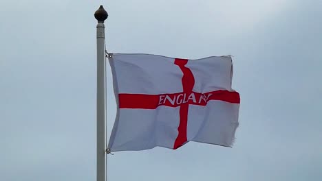 Slow-motion-clip-of-the-English-flag-of-St-George-fluttering-in-the-wind