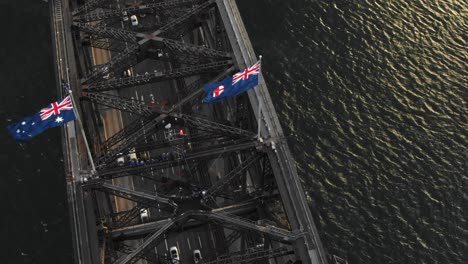Aerial-circling-over-Sydney-Harbor-Bridge-and-car-traffic
