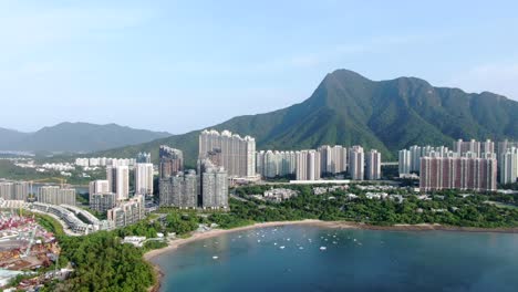 Aerial-view-of-Hong-Kong-Wu-Kai-Sha-area-with-modern-residential-building-complex-and-Tolo-Harbour-open-bay