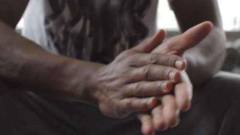 Black-Male-Athlete-Rubs-Hands-Together-Before-Workout,-Game,-Close-Up