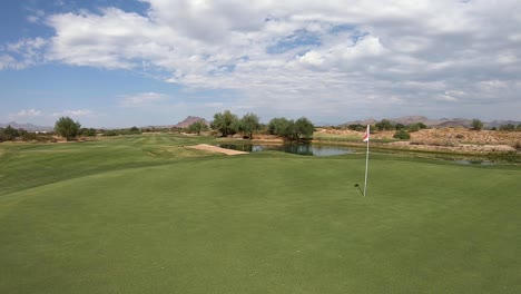 A-view-from-the-pin-on-the-green-to-the-fairway-at-a-golf-course-in-Scottsdale,-Arizona