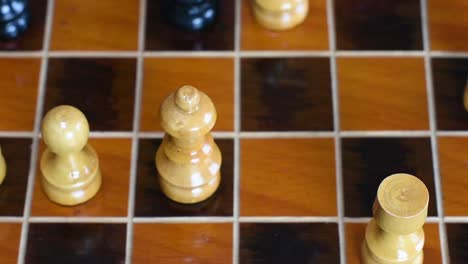 Checkmate.Wood-chessboard-and-wooden-chess-pieces.-Chess-game