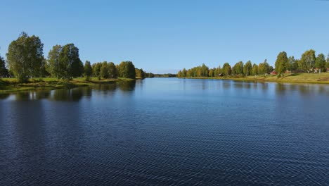 Calm-River-And-Green-Landscape-Of-Dalarna,-Sweden---Aerial-moving-shot