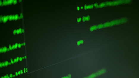 Close-up-shot-of-green-computer-code-typing-onto-screen