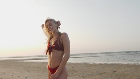 Beautiful-blonde-model-posing-at-the-beach-in-a-bikini-set