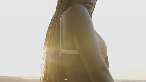 Beautiful-black-model-posing-at-the-beach-with-a-bikini-set