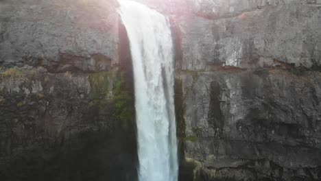 Drone-shot-of-waterfall-in-Washington-state