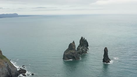Reynisdrangar-rock-stacks-at-south-shore-of-Iceland,-tourist-attraction