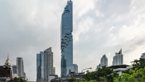 A-4K-time-lapse-of-Mahanakon-Tower,-Bangkok-Thailand-with-cloud-movement