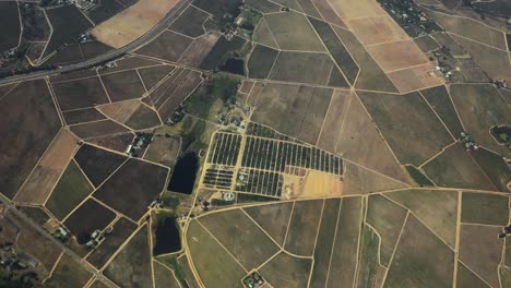 Aerial-shot-of-some-beautiful-green-farmland-and-agriculture-zones