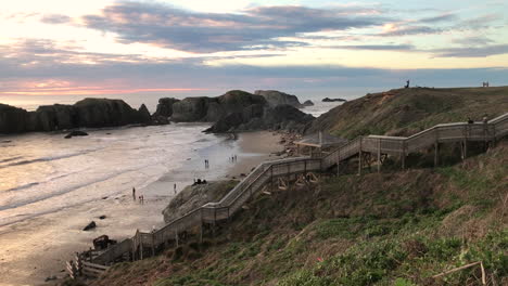 Video-starts-out-with-a-happy-dog-walking-on-the-bluff-over-Bandon-beach-and-then-camera-panning-for-a-panorama-of-the-whole-State-Park-beach