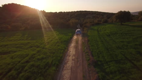 Drone-Following-Rally-Car-in-Mediterrane-Landscape