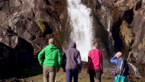Hikers-Trekking-in-Slow-Motion-towards-waterfall.mp4