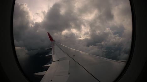 Sunset-and-lovely-clouds-from-the-window-of-the-left-wing-of-the-airplane-brings-back-travel-memories