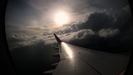 Sunset-and-lovely-clouds-from-the-window-of-the-left-wing-of-the-airplane-brings-back-travel-memories