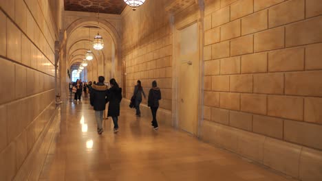 People-Walking-At-The-Hallway-Of-The-New-York-Public-Library-Near-Bryant-Park,-New-York,-USA