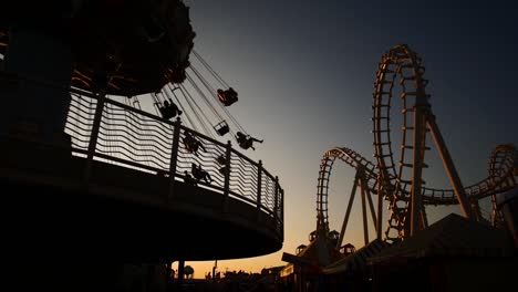 Carnival-rides-during-sunset-in-slow-motion