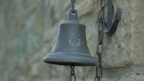 An-ancient-bell-next-to-a-castle