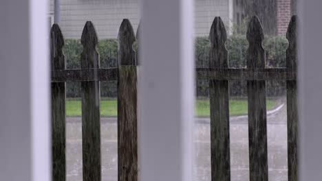 Rain-through-railing-of-porch
