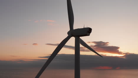 Windturbines-during-sunset-on-the-island-Neeltje-Jans,-the-Netherlands
