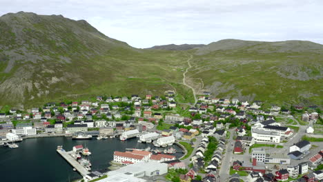 Flight-across-Noway---Honningsvag-city-from-ocean-to-Hiking-trails-in-back-of-it