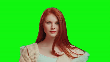 Beautiful-red-haired-girl-on-a-green-background,-easy-to-cut