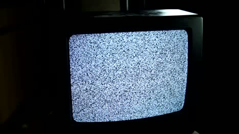 Old-and-broken-tv-is-taken-away