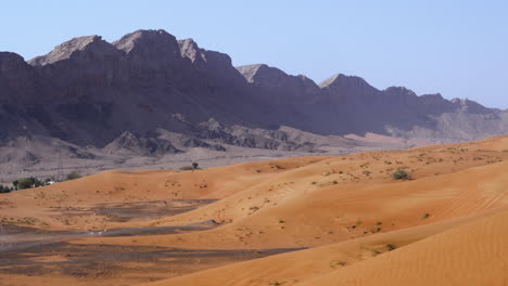Fossil-Rock-Mountain-Ridge-Against-Blue-Sky-In-Sharjah,-United-Arab-Emirates,-Dubai
