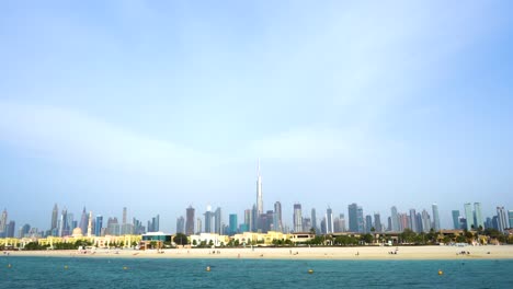 Panorama-Of-Dubai-Downtown-With-Burj-Khalifa-Against-Blue-Sky-In-United-Arab-Emirates