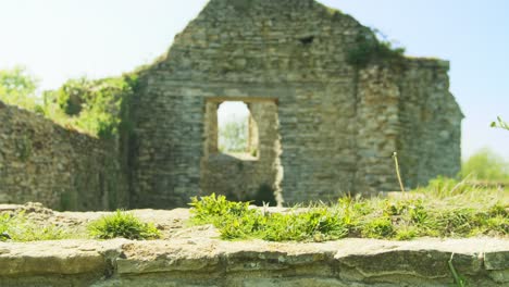 4K-footage-of-black-man-walking-into-old-church-ruins-in-England