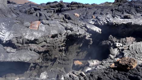 Close-up-shot-of-steaming-hot-volcanic-rock