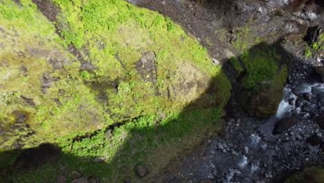 Aerial-view-of-the-steep-canyon-walls-covered-with-green-moss