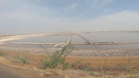 Truck-shot-of-saline-by-Pink-Lake-in-Senegal