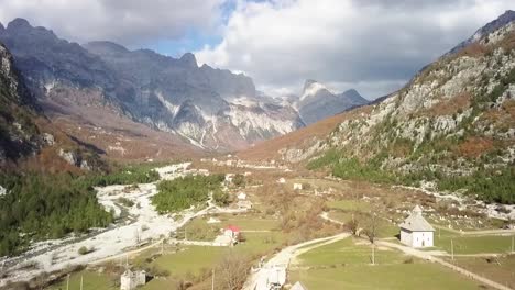 A-hidden-gem-of-Europe-the-undiscovered-part-of-Albania-with-Thethi-Church-and-the-Albania-Alps-in-the-background