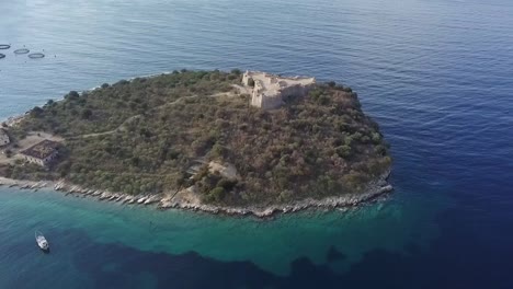 Aerial-view-of-the-castle-on-an-Island-along-the-coastline-of-Albania