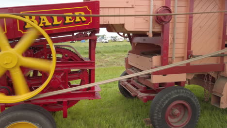 A-working-vintage-steam-powered-hay-baler-in-action