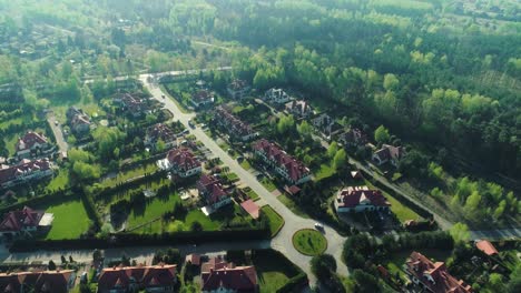 Aerial-view-of-a-housing-estate-in-the-suburbs-surrounded-by-forest