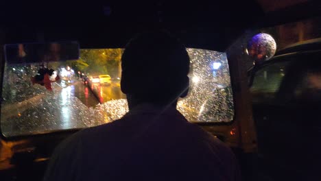 View-from-a-auto-rickshaw-on-a-street-in-Varanasi,-India