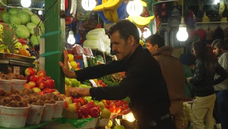 Merchants-in-Tajrish-Bazaar-Organising-Fruit-at-their-Stands