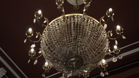 luxury-old-chandelier-in-an-old-mansion-with-camera-movement-4